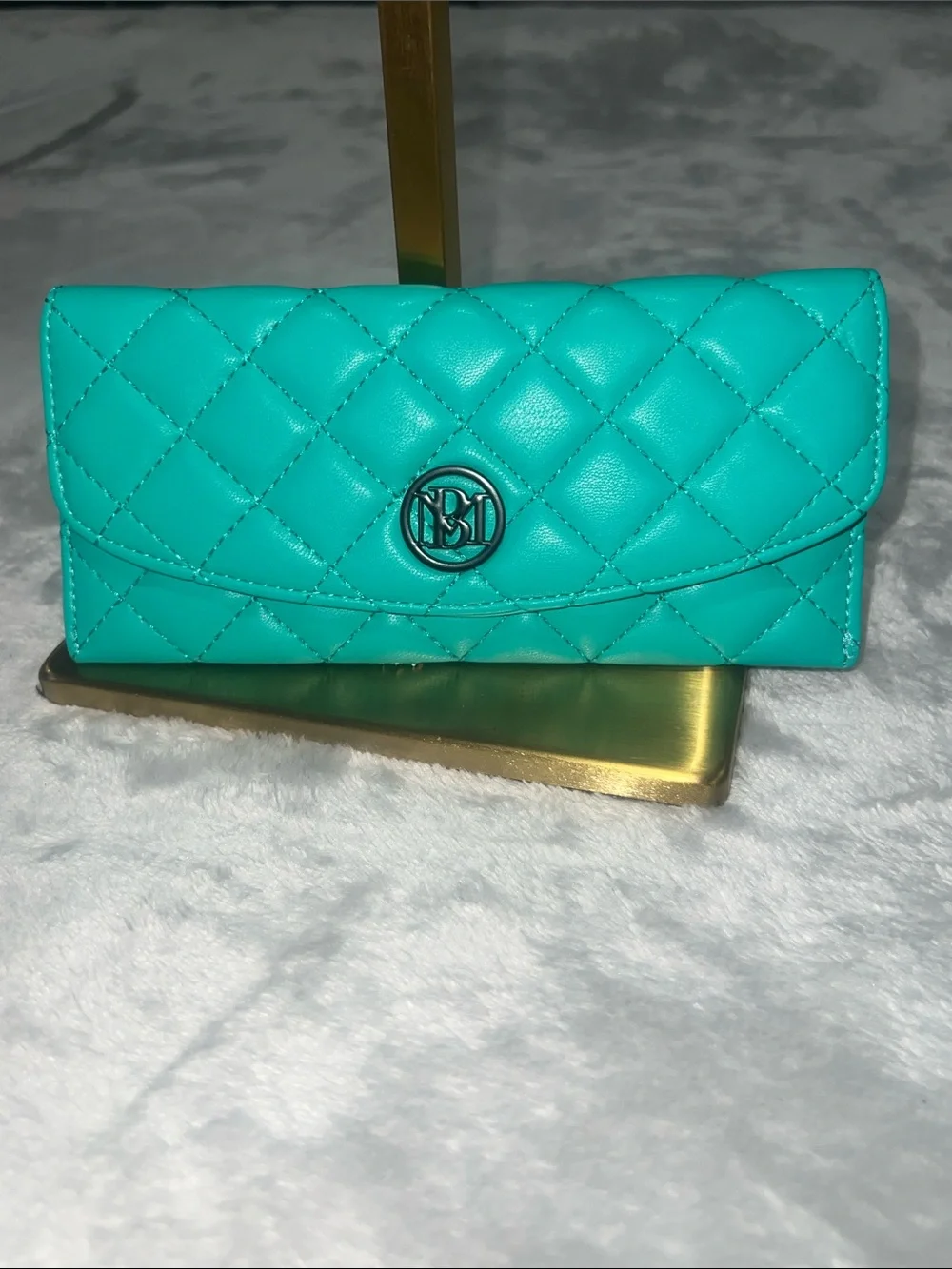 Badgley Mischka Quilted Large Slim Wallet in sweet mint green.